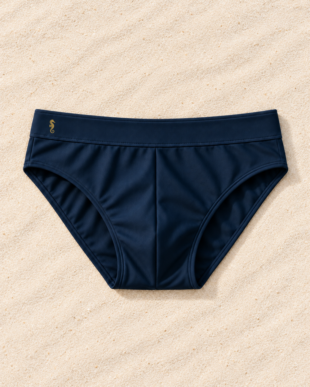 the dorian azzurro front — pale ivory sand, original right-facing gold seahorse embroidery